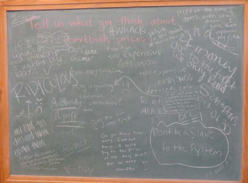 picture of blackboard with student opinions about textbook prices