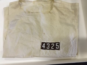 One of the prisoner’s outfits from the experiment, courtesy of The Cummings Center for the History of Psychology.  The prisoners wore only thin sheets with their number on them for identification.  