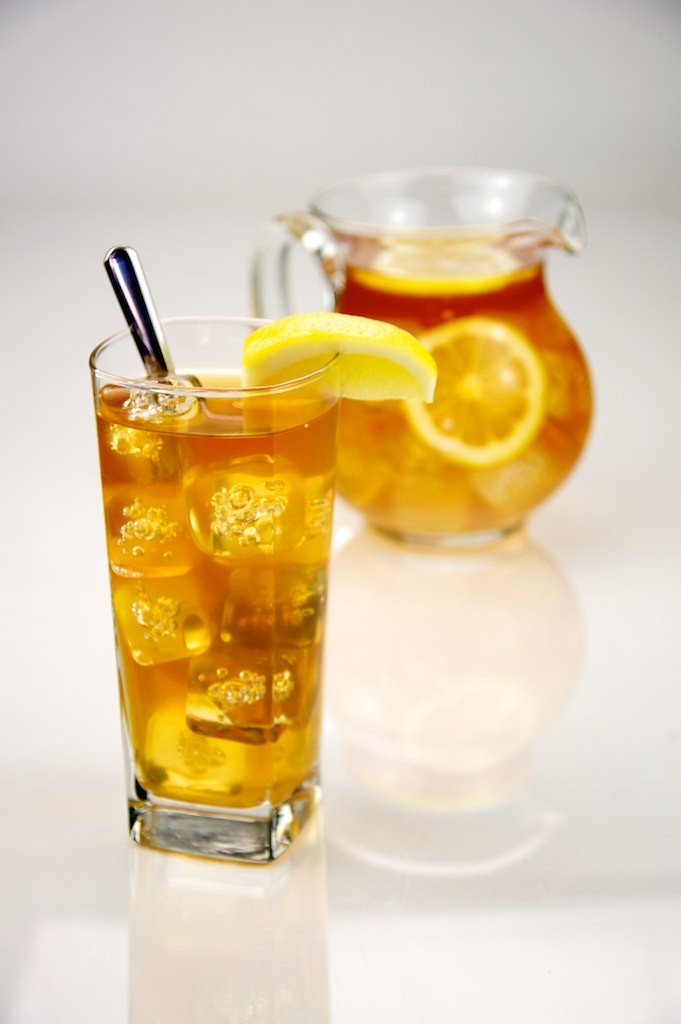Pitcher of Iced Tea with a Glass of Ice Tea